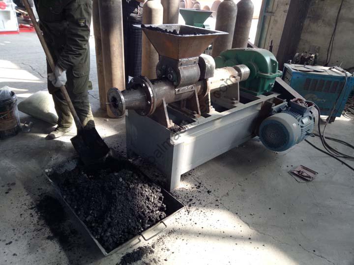What is the detailed working process of the coal briquette machine?