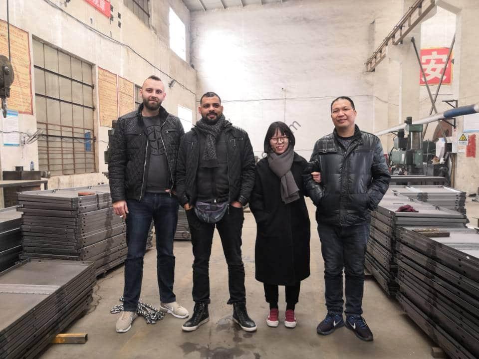 group photo in charcoal machine factory